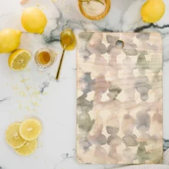Jacqueline Maldonado Dye Ovals Muted Cutting Board - Deny Designs