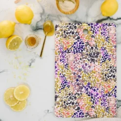 Ninola Design Purple Speckled Painting Watercolor Stains Cutting Board - Deny Designs