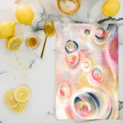 Stephanie Corfee Girlie Go Round Cutting Board - Deny Designs