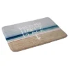 Leah Flores Happy PlacexBeach Cushion Bath Mat Blue - Deny Designs -Deny Designs Shop GUEST 66b4ed56 75f2 4da8 97c0 078ccd739efe