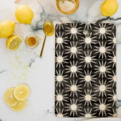 Schatzi Brown Mila Sun Black Cutting Board - Deny Designs
