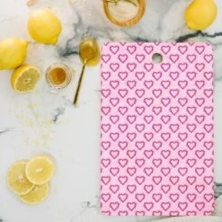 Lisa Argyropolous Mini Hearts Pink Cutting Board - Deny Designs