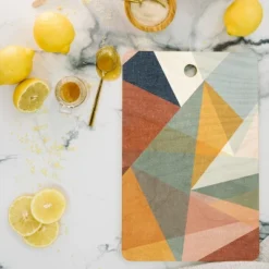 Little Arrow Design Co Modern Triangle Mosaic Multi Rectangle Cutting Board - Deny Designs